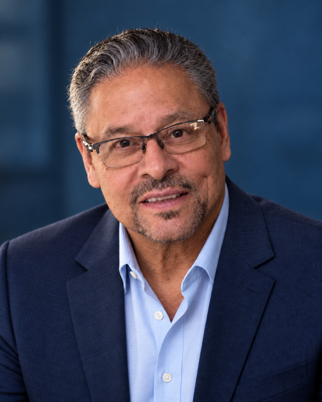 Professional portrait of Reynaldo Torres Jr., Open MRI applications trainer